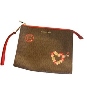 - Michael Kors travel bag. Never used. Excellent condition.